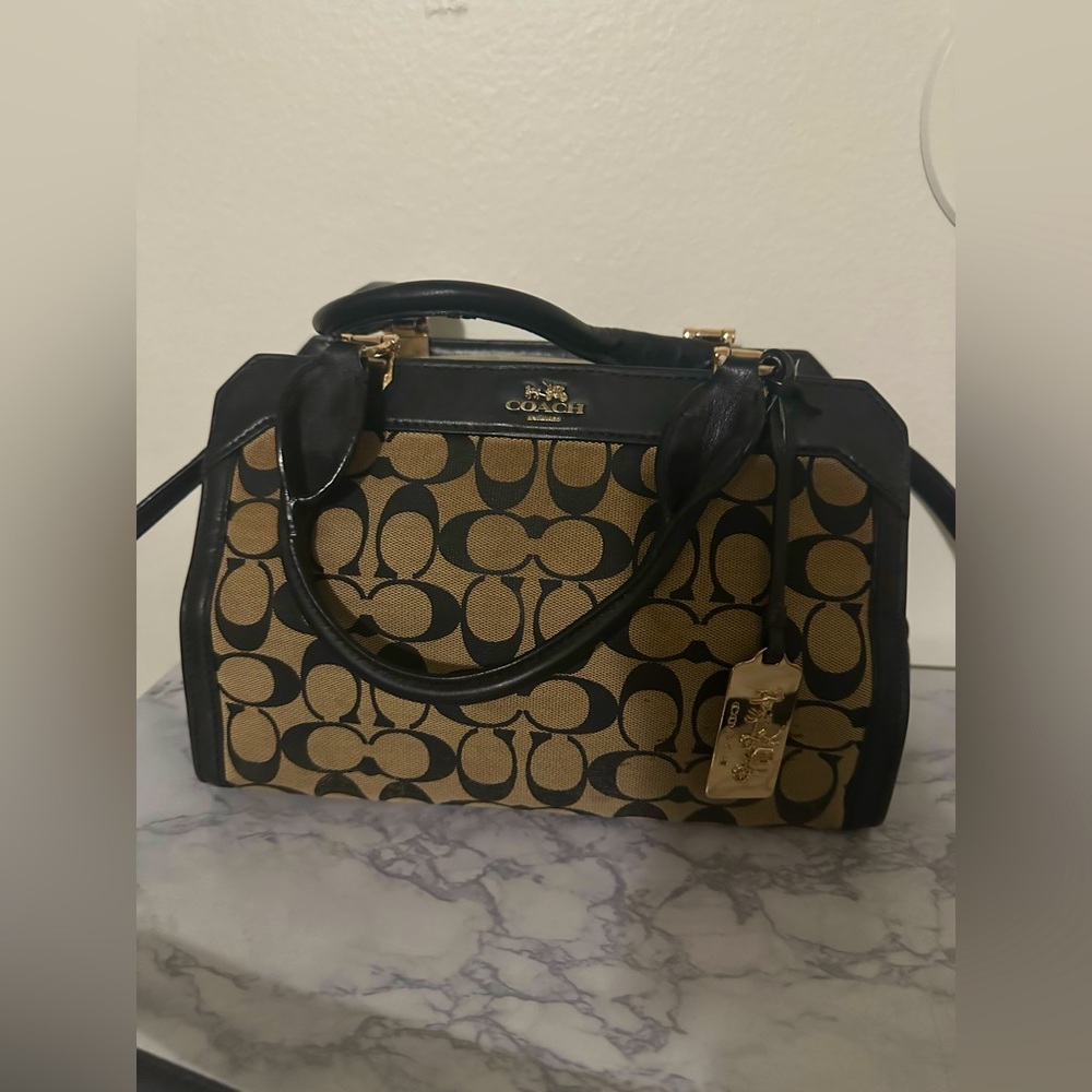 BROWN AND BLACK COACH PURSE